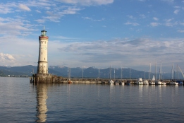 Lindau Lighthouse with the Alps in the background