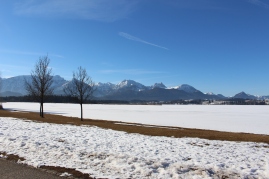 Hopfen am see in winter with the alps in the background